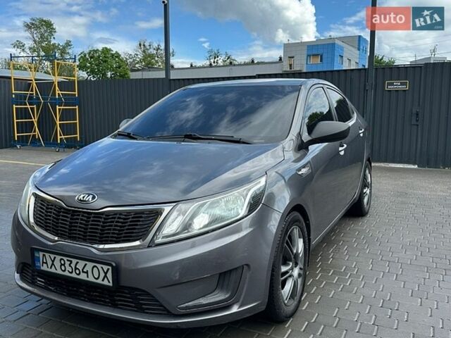 Серый Киа Рио, объемом двигателя 1.4 л и пробегом 146 тыс. км за 7900 $, фото 1 на Automoto.ua