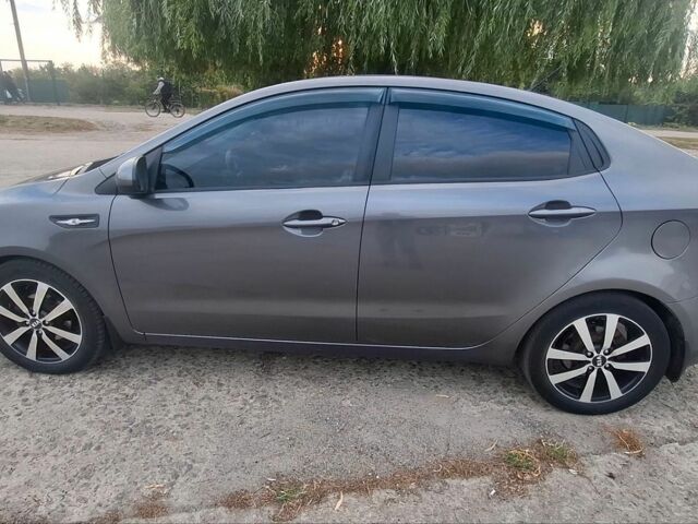 Серый Киа Рио, объемом двигателя 1.4 л и пробегом 125 тыс. км за 7500 $, фото 1 на Automoto.ua