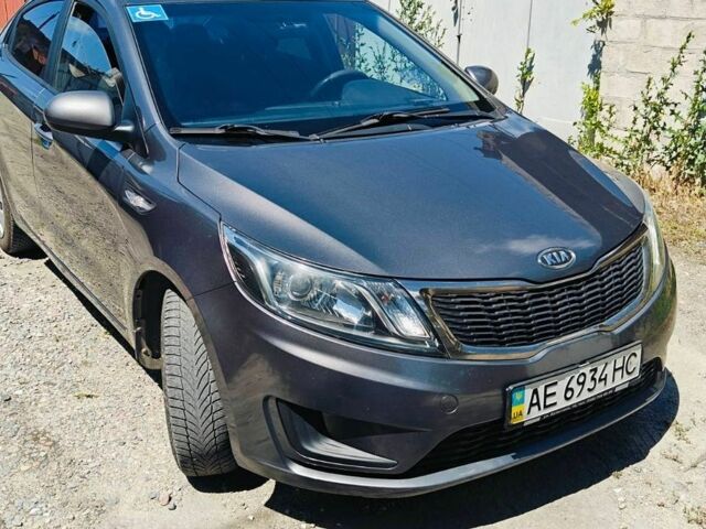 Серый Киа Рио, объемом двигателя 1.4 л и пробегом 190 тыс. км за 7000 $, фото 1 на Automoto.ua