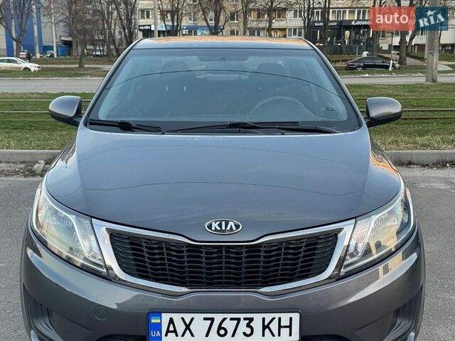 Серый Киа Рио, объемом двигателя 1.4 л и пробегом 103 тыс. км за 9000 $, фото 1 на Automoto.ua