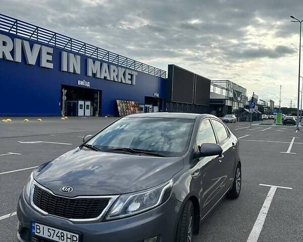 Серый Киа Рио, объемом двигателя 1.4 л и пробегом 320 тыс. км за 6300 $, фото 1 на Automoto.ua