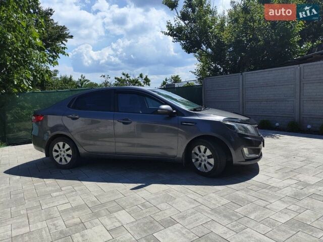 Сірий Кіа Ріо, об'ємом двигуна 1.59 л та пробігом 173 тис. км за 8500 $, фото 1 на Automoto.ua