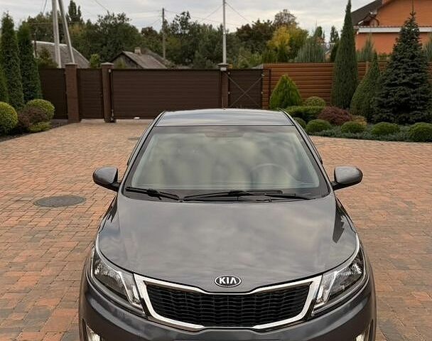 Серый Киа Рио, объемом двигателя 1.4 л и пробегом 91 тыс. км за 8450 $, фото 1 на Automoto.ua