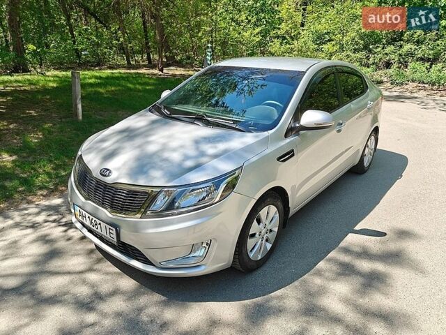 Серый Киа Рио, объемом двигателя 1.6 л и пробегом 130 тыс. км за 8000 $, фото 1 на Automoto.ua