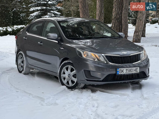Серый Киа Рио, объемом двигателя 1.4 л и пробегом 260 тыс. км за 7799 $, фото 1 на Automoto.ua