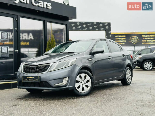 Серый Киа Рио, объемом двигателя 1.4 л и пробегом 245 тыс. км за 5900 $, фото 1 на Automoto.ua