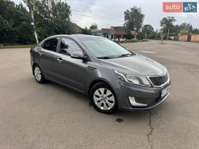 Сірий Кіа Ріо, об'ємом двигуна 1.59 л та пробігом 205 тис. км за 5800 $, фото 1 на Automoto.ua