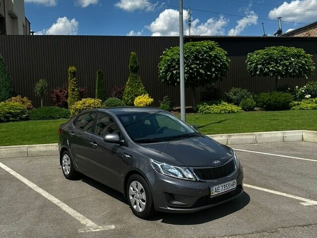 Серый Киа Рио, объемом двигателя 1.4 л и пробегом 30 тыс. км за 9900 $, фото 1 на Automoto.ua