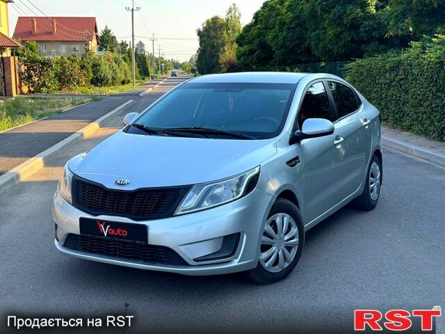 Сірий Кіа Ріо, об'ємом двигуна 1.4 л та пробігом 230 тис. км за 5799 $, фото 1 на Automoto.ua