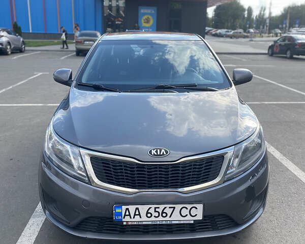 Серый Киа Рио, объемом двигателя 1.4 л и пробегом 205 тыс. км за 6500 $, фото 1 на Automoto.ua