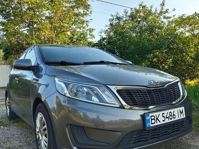 Серый Киа Рио, объемом двигателя 1.4 л и пробегом 135 тыс. км за 8300 $, фото 1 на Automoto.ua