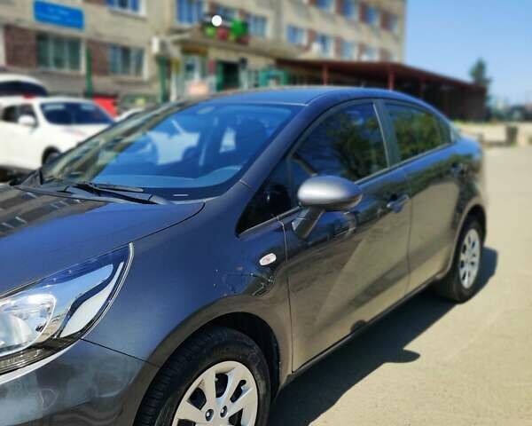 Серый Киа Рио, объемом двигателя 1.4 л и пробегом 72 тыс. км за 9800 $, фото 1 на Automoto.ua