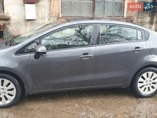 Серый Киа Рио, объемом двигателя 1.4 л и пробегом 145 тыс. км за 10400 $, фото 1 на Automoto.ua