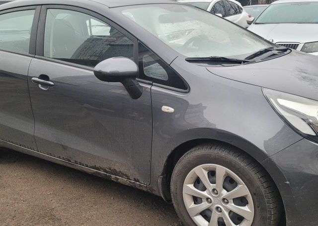 Серый Киа Рио, объемом двигателя 1.4 л и пробегом 43 тыс. км за 6500 $, фото 1 на Automoto.ua