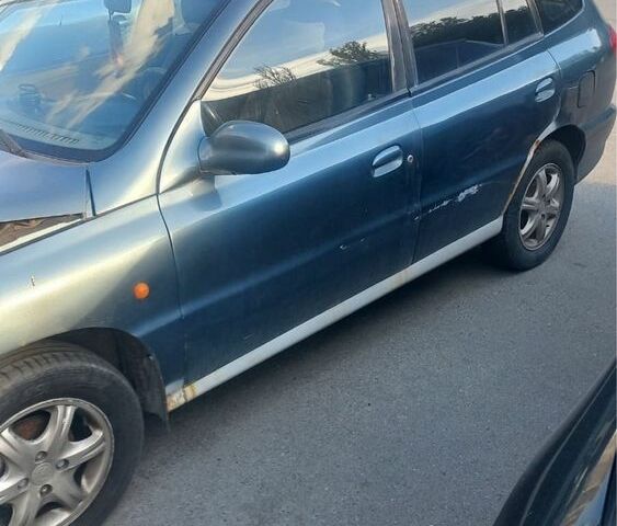 Серый Киа Рио, объемом двигателя 1.5 л и пробегом 315 тыс. км за 1250 $, фото 1 на Automoto.ua