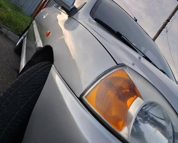 Серый Киа Рио, объемом двигателя 1.34 л и пробегом 216 тыс. км за 3000 $, фото 1 на Automoto.ua