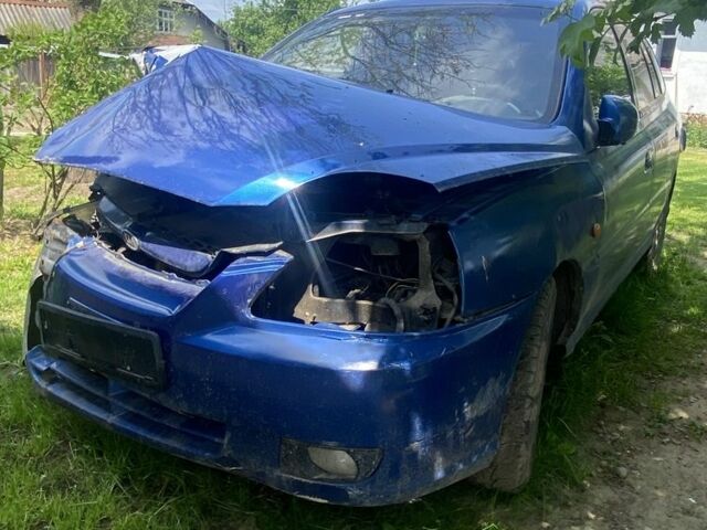 Синий Киа Рио, объемом двигателя 1.3 л и пробегом 280 тыс. км за 800 $, фото 1 на Automoto.ua
