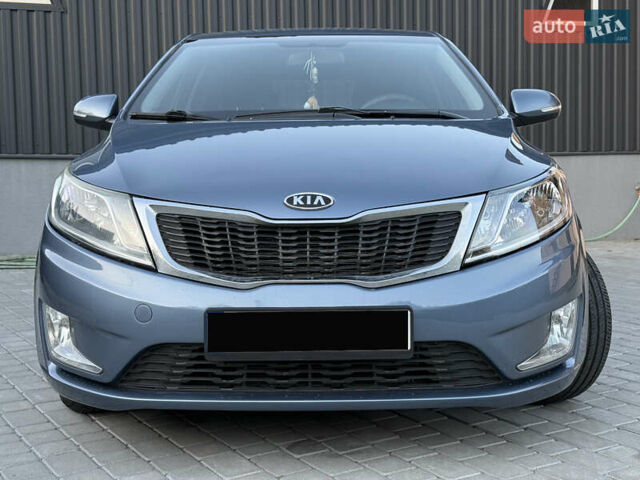 Синій Кіа Ріо, об'ємом двигуна 1.6 л та пробігом 103 тис. км за 8300 $, фото 1 на Automoto.ua