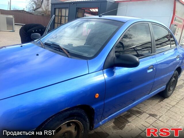 Синий Киа Рио, объемом двигателя 1.3 л и пробегом 445 тыс. км за 1700 $, фото 1 на Automoto.ua