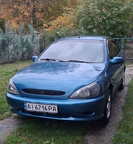 Синий Киа Рио, объемом двигателя 1.34 л и пробегом 330 тыс. км за 2400 $, фото 1 на Automoto.ua