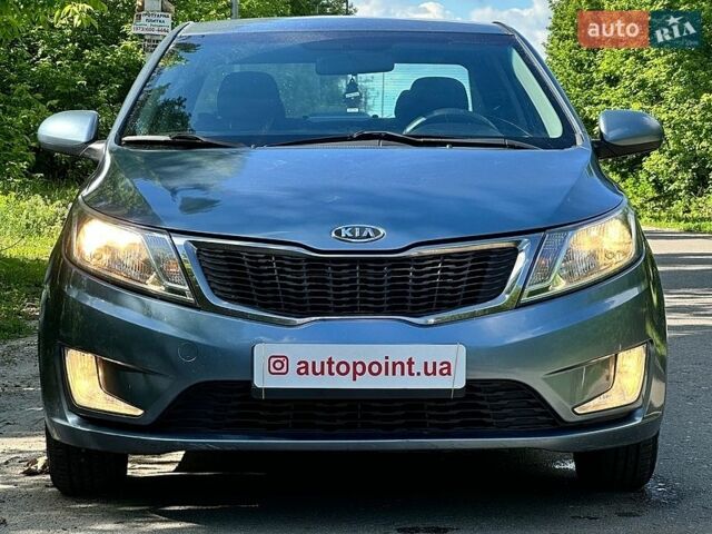 Синий Киа Рио, объемом двигателя 1.59 л и пробегом 128 тыс. км за 6800 $, фото 1 на Automoto.ua