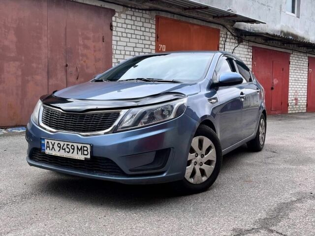 Синий Киа Рио, объемом двигателя 1.4 л и пробегом 219 тыс. км за 7300 $, фото 1 на Automoto.ua
