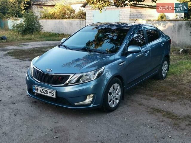Синій Кіа Ріо, об'ємом двигуна 1.4 л та пробігом 138 тис. км за 8300 $, фото 1 на Automoto.ua