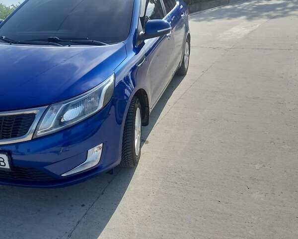 Синий Киа Рио, объемом двигателя 1.6 л и пробегом 211 тыс. км за 7600 $, фото 1 на Automoto.ua