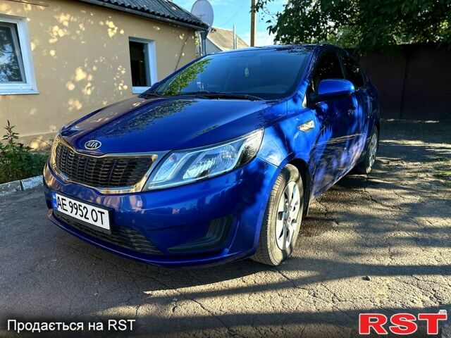 Синий Киа Рио, объемом двигателя 1.4 л и пробегом 212 тыс. км за 6500 $, фото 1 на Automoto.ua