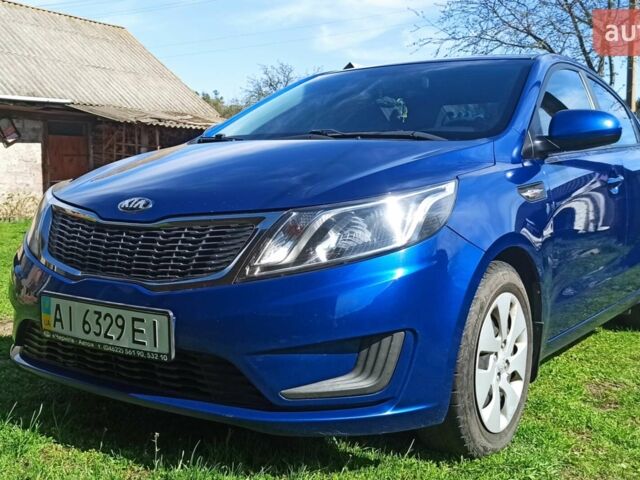 Синій Кіа Ріо, об'ємом двигуна 1.4 л та пробігом 175 тис. км за 7600 $, фото 1 на Automoto.ua