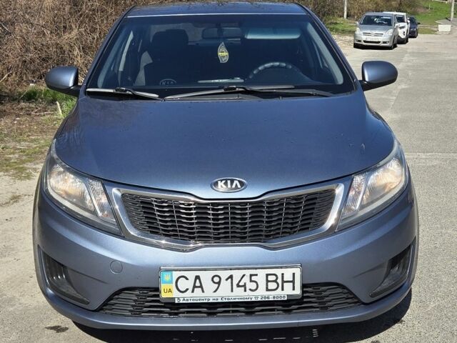Синий Киа Рио, объемом двигателя 1.4 л и пробегом 292 тыс. км за 6500 $, фото 1 на Automoto.ua