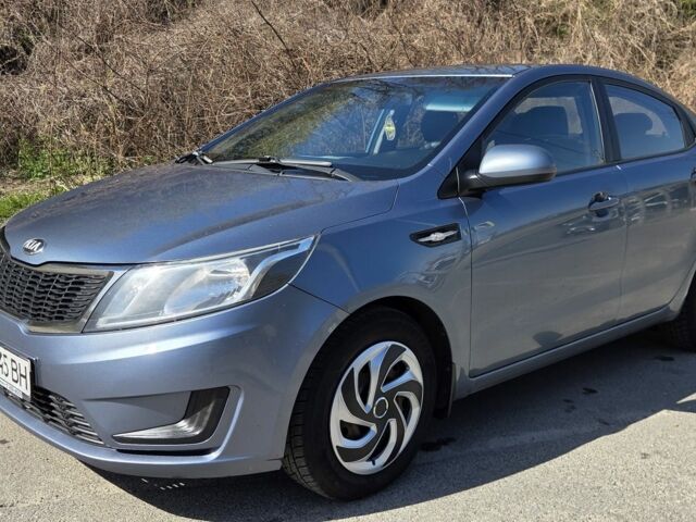 Синий Киа Рио, объемом двигателя 1.4 л и пробегом 291 тыс. км за 6900 $, фото 1 на Automoto.ua