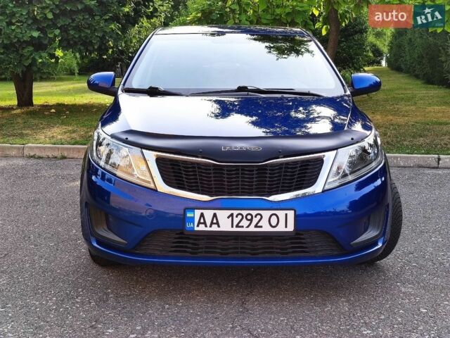 Синий Киа Рио, объемом двигателя 1.4 л и пробегом 129 тыс. км за 7600 $, фото 1 на Automoto.ua