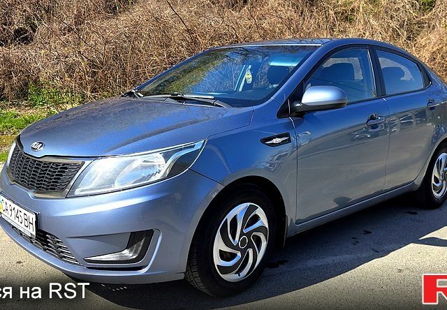 Синий Киа Рио, объемом двигателя 1.4 л и пробегом 291 тыс. км за 6900 $, фото 1 на Automoto.ua