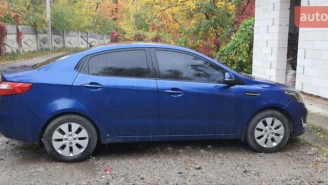 Синій Кіа Ріо, об'ємом двигуна 1.6 л та пробігом 222 тис. км за 6150 $, фото 1 на Automoto.ua
