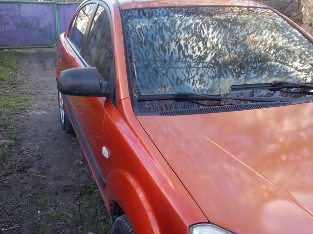 Оранжевый Киа Рио, объемом двигателя 1.4 л и пробегом 447 тыс. км за 4200 $, фото 1 на Automoto.ua