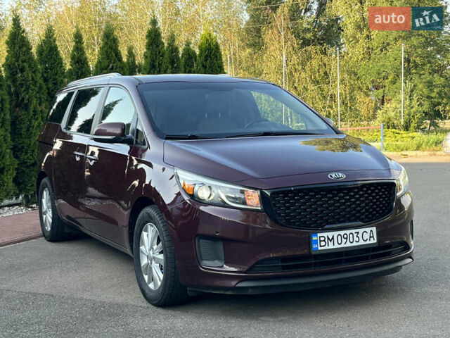 Красный Киа Седона, объемом двигателя 3.34 л и пробегом 126 тыс. км за 15550 $, фото 1 на Automoto.ua