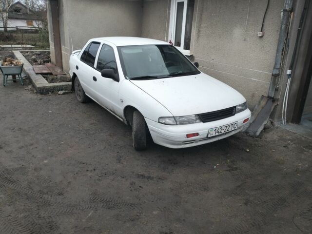 Білий Кіа Сефія, об'ємом двигуна 0 л та пробігом 288 тис. км за 400 $, фото 1 на Automoto.ua