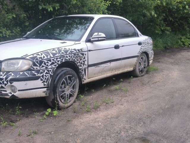 Белый Киа Сефия, объемом двигателя 0 л и пробегом 300 тыс. км за 400 $, фото 1 на Automoto.ua