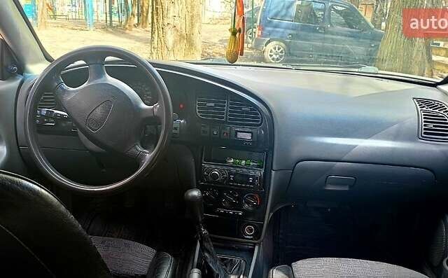 Белый Киа Сефия, объемом двигателя 1.6 л и пробегом 364 тыс. км за 2600 $, фото 1 на Automoto.ua