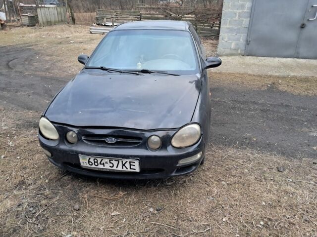 Чорний Кіа Сефія, об'ємом двигуна 1.5 л та пробігом 300 тис. км за 1308 $, фото 1 на Automoto.ua