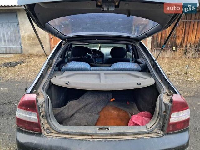 Чорний Кіа Сефія, об'ємом двигуна 1.5 л та пробігом 300 тис. км за 1200 $, фото 1 на Automoto.ua