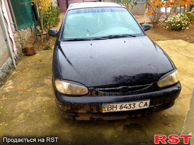 Черный Киа Сефия, объемом двигателя 2 л и пробегом 0 тыс. км за 650 $, фото 1 на Automoto.ua