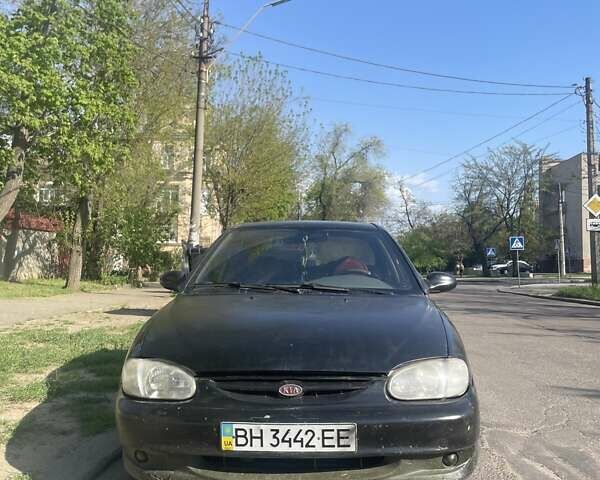 Черный Киа Сефия, объемом двигателя 1.5 л и пробегом 230 тыс. км за 1600 $, фото 1 на Automoto.ua