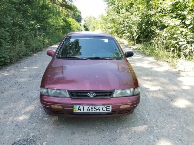 Красный Киа Сефия, объемом двигателя 1.5 л и пробегом 123 тыс. км за 850 $, фото 1 на Automoto.ua