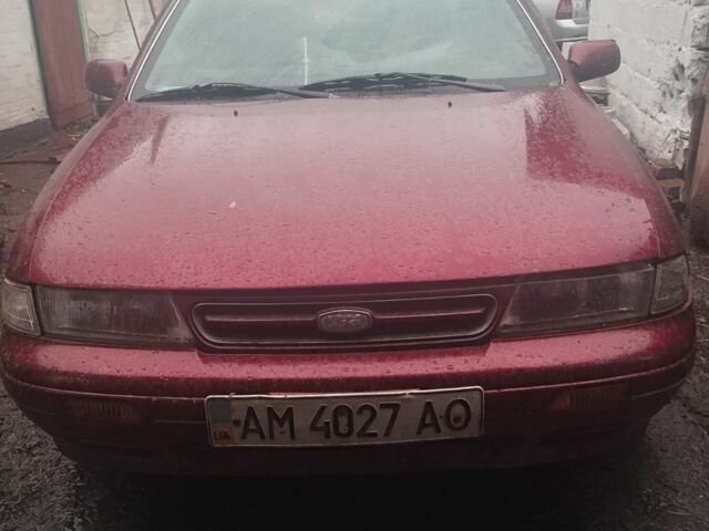 Красный Киа Сефия, объемом двигателя 1.5 л и пробегом 255 тыс. км за 1000 $, фото 1 на Automoto.ua