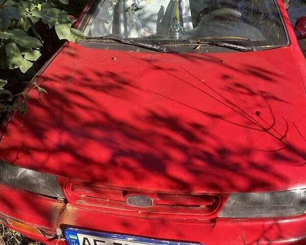 Червоний Кіа Сефія, об'ємом двигуна 1.6 л та пробігом 300 тис. км за 411 $, фото 1 на Automoto.ua