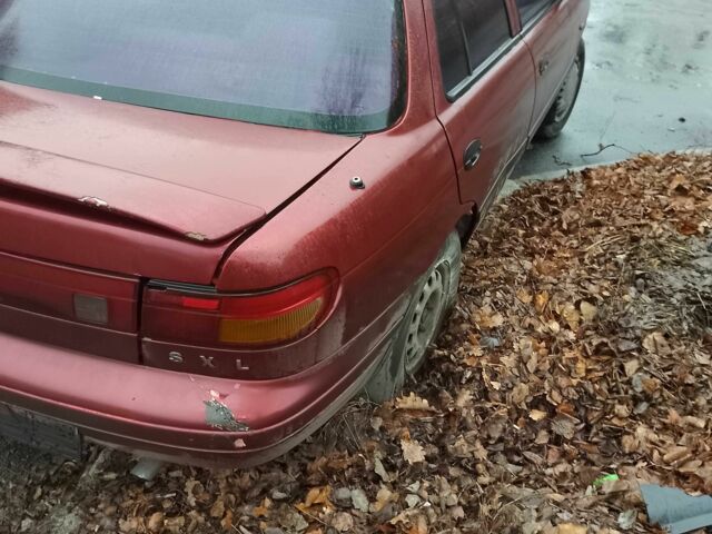 Красный Киа Сефия, объемом двигателя 1.6 л и пробегом 195 тыс. км за 474 $, фото 1 на Automoto.ua