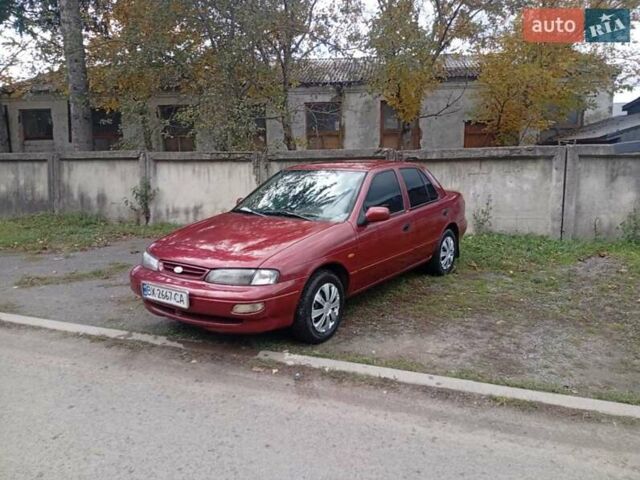 Красный Киа Сефия, объемом двигателя 1.5 л и пробегом 65 тыс. км за 1550 $, фото 1 на Automoto.ua