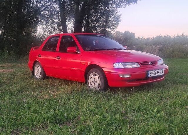 Красный Киа Сефия, объемом двигателя 1.5 л и пробегом 3 тыс. км за 2600 $, фото 1 на Automoto.ua